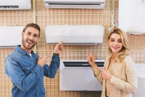 Couple looking at heat pump specials